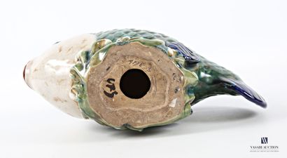 Enameled terracotta subject featuring a fish...