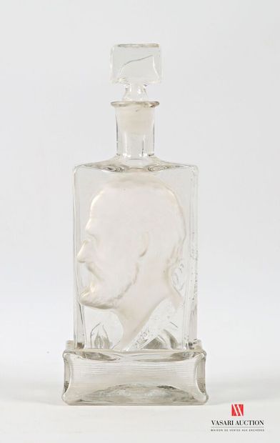 Glass bottle with molded decoration in the...