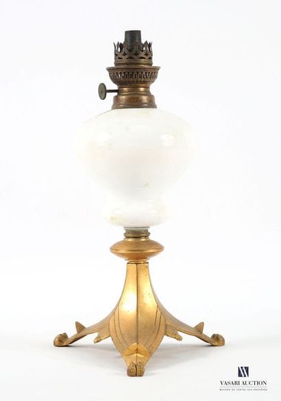 A kerosene lamp, the white opaline glass...