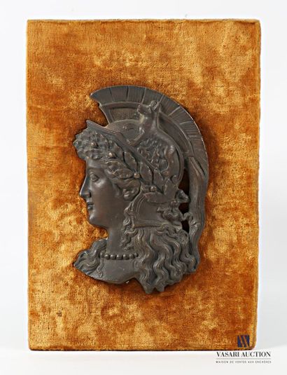 Regula plate with brown patina depicting...