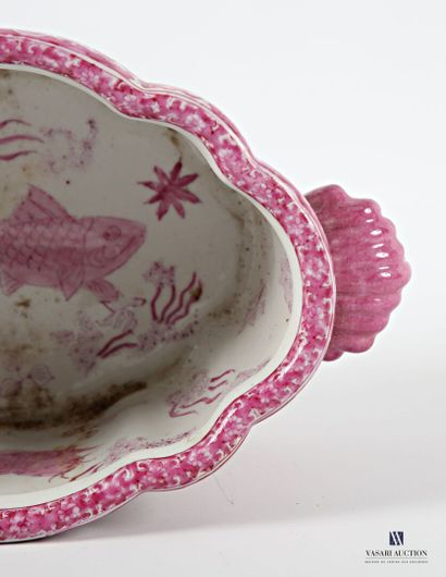 CHINA
Glazed earthenware oval bowl, the body...