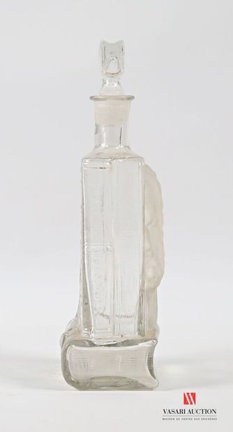 Glass bottle with molded decoration in the...