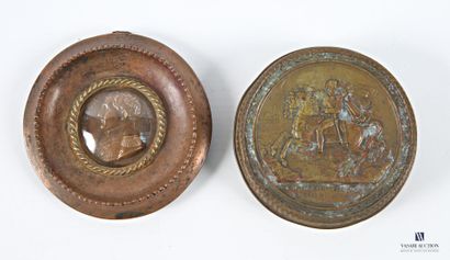 Set comprising a round brass box featuring...