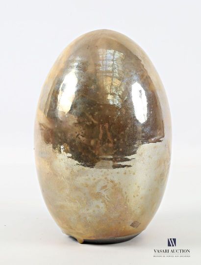 Glazed stoneware egg with gold-tone glaze,...
