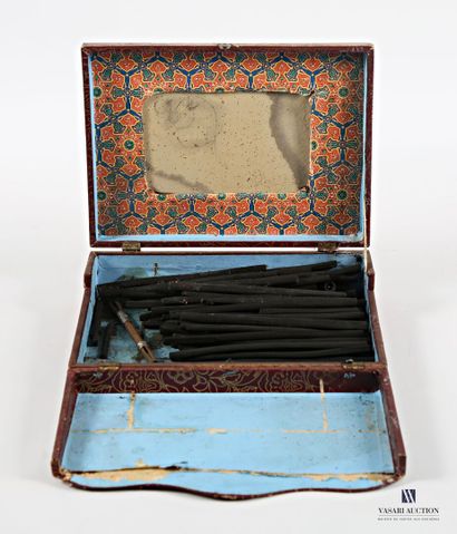 Dark wood box with paper embossed with flower...