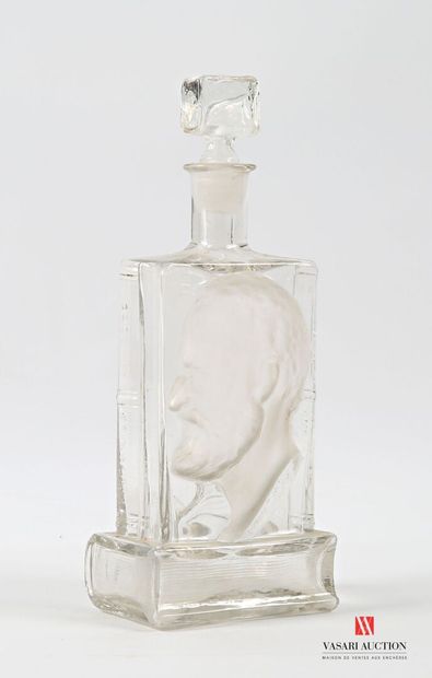 Glass bottle with molded decoration in the...