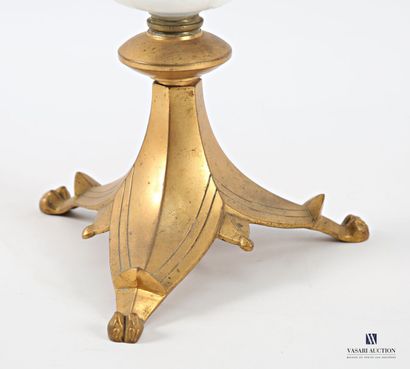 A kerosene lamp, the white opaline glass...