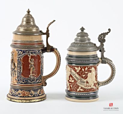 Two polychrome earthenware covered mugs,...
