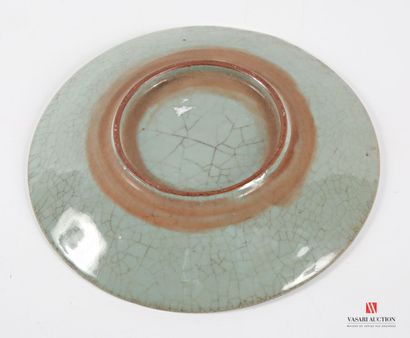 CHINA
Glazed earthenware round dish with...