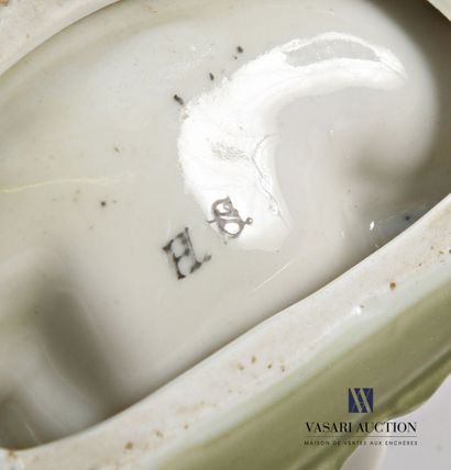 Polychrome-treated white porcelain pocket...