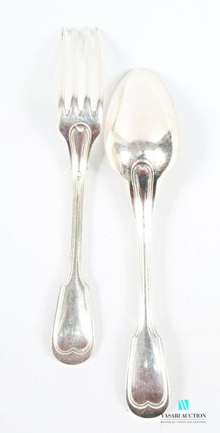 Two silver-plated table settings and five...