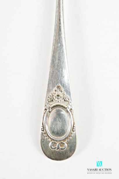 A silver-plated serving spoon with a plain...