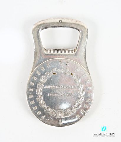 Silver-plated metal bottle opener, the medal-shaped...