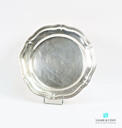 Round dish in silver-plated metal, the scalloped...