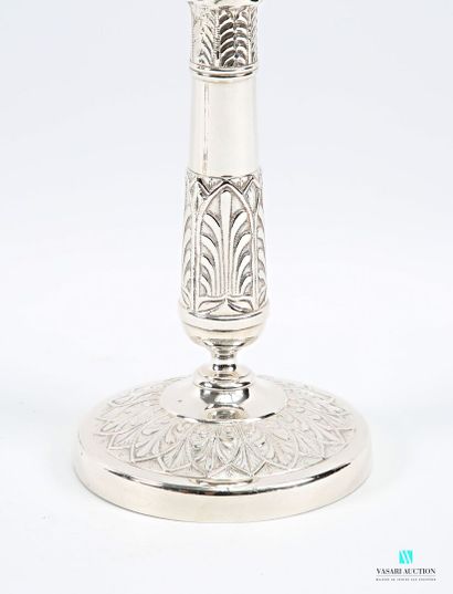 Pair of silver-plated candlesticks standing...