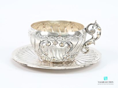 Two silver-plated coffee cups and saucers...
