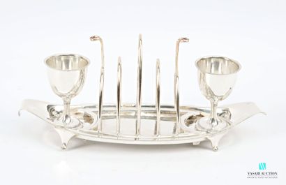 Silver-plated egg service, featuring a toast...