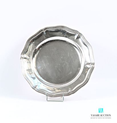 Round dish in silver-plated metal, the contoured...