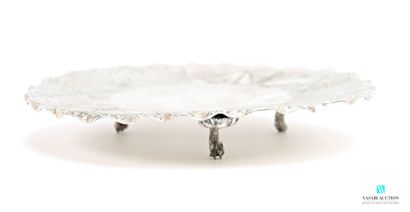 Round-shaped trivet in hammered metal decorated...
