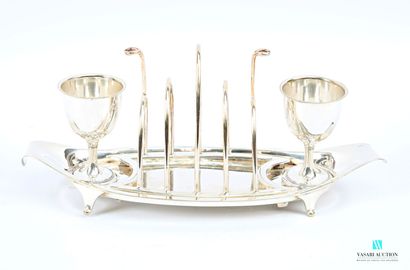 Silver-plated egg service, featuring a toast...