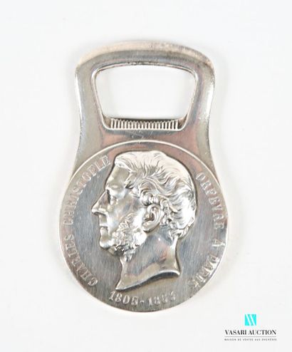 Silver-plated metal bottle opener, the medal-shaped...