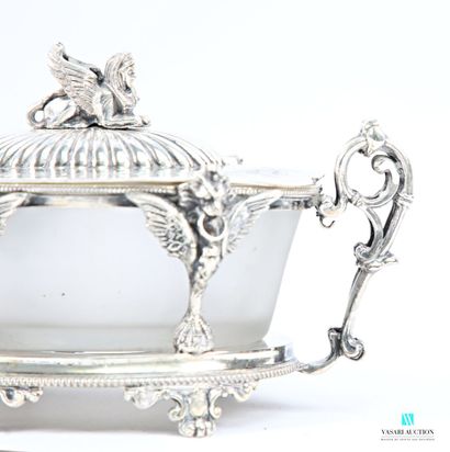 Oval-shaped silver-plated sugar bowl standing...