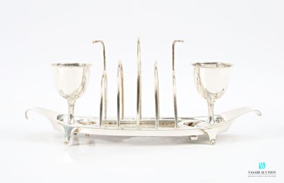 Silver-plated egg service, featuring a toast...