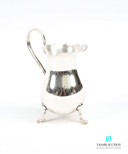 Silver-plated baluster-shaped milk jug standing...