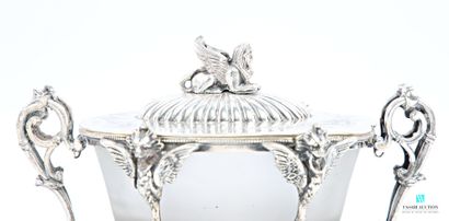 Oval-shaped silver-plated sugar bowl standing...