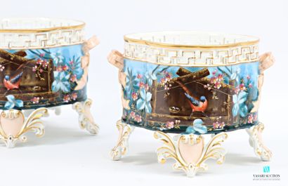 PARIS
Paire de caches-pots en porcelaine...