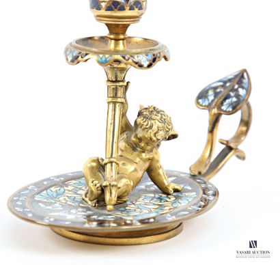 Bougeoir à main en bronze à décor en émaux...