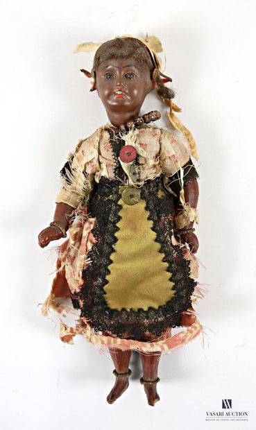 Porcelain-headed doll depicting a woman in...
