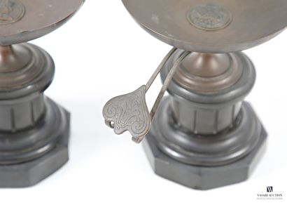 A pair of bronze cassolettes with a brown...