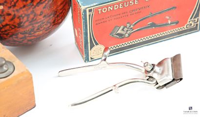 Set including an “Etoile” lawn mower in its...
