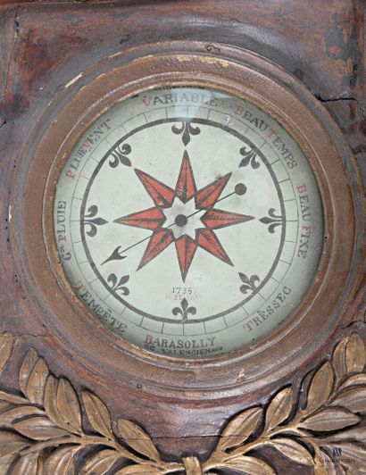 Barometer-thermometer in carved wood, brown...