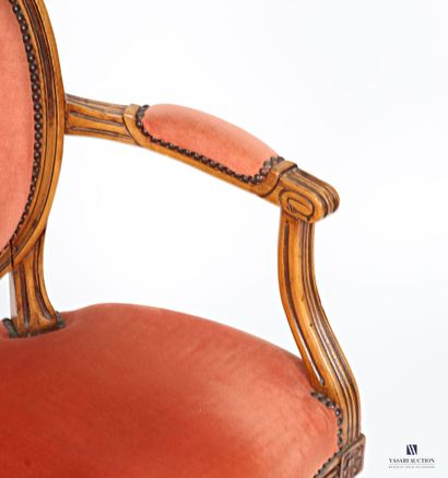 Pair of molded fruitwood armchairs with medallion...