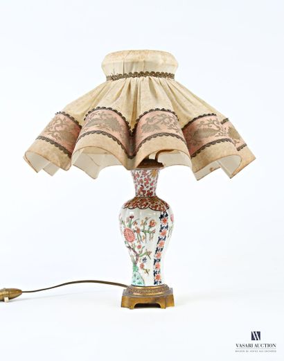 A baluster-shaped vase converted into a lamp,...