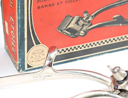 Set including an “Etoile” lawn mower in its...