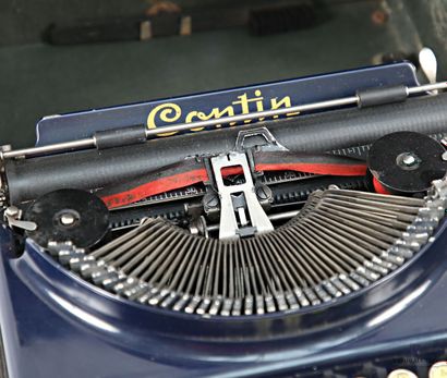 CONTIN E.C.P 
Blue-lacquered metal typewriter...