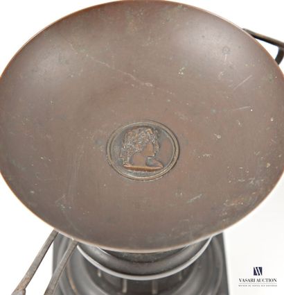 A pair of bronze cassolettes with a brown...