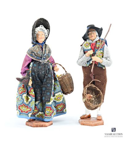 Set of two terracotta santons depicting a...