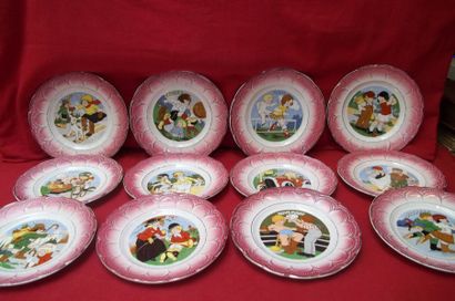 Ensemble de 12 assiettes polychromes, représentant...