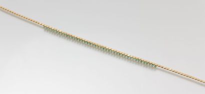 Collier en or jaune à maillon pastillé à

motif...