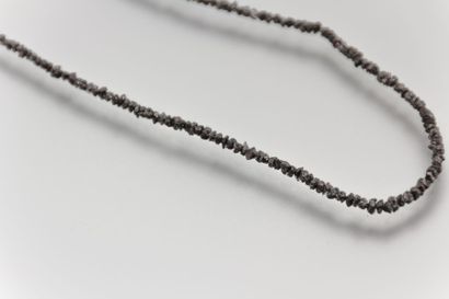 Collier de diamants bruts noirs, le fermoir

en...