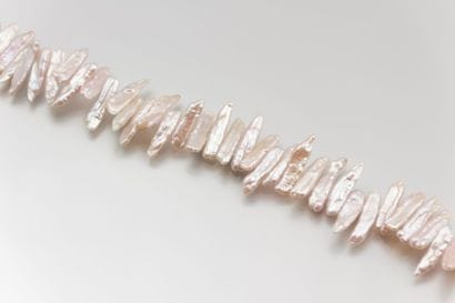 Collier chocker de perles d’eau douce

longues,...