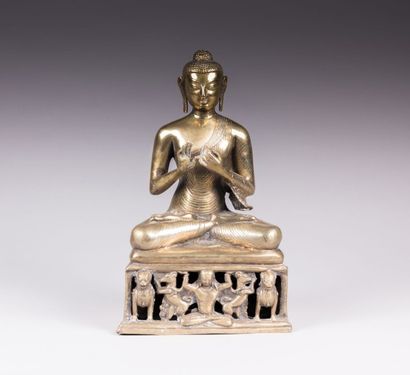 CHINE

Buddha Shakyamuni en bronze doré reposant

sur...