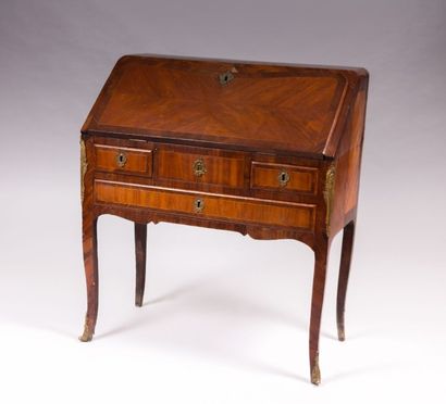 Bureau de pente en placage de bois de

rose...
