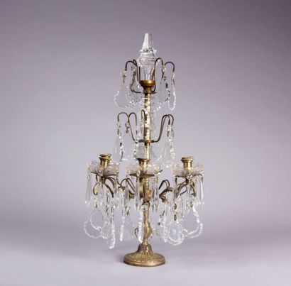 Girandole en bronze posant sur une base

ronde...