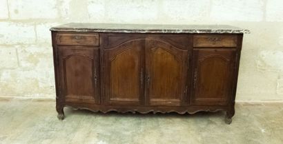 Buffet en bois naturel mouluré ouvrant dans...