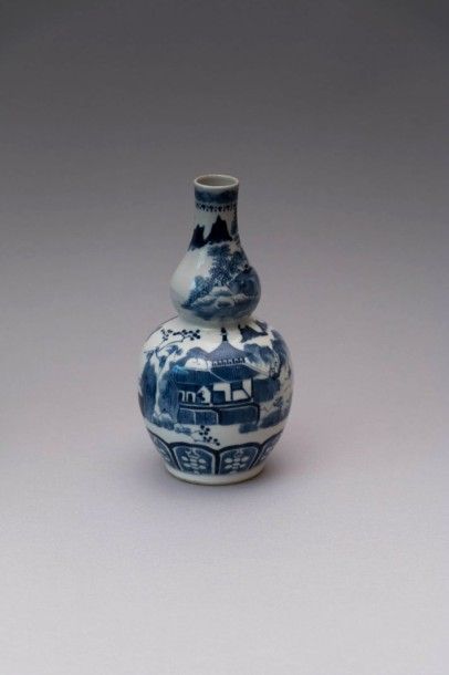 CHINE

Vase double gourde en porcelaine blanche

à...
